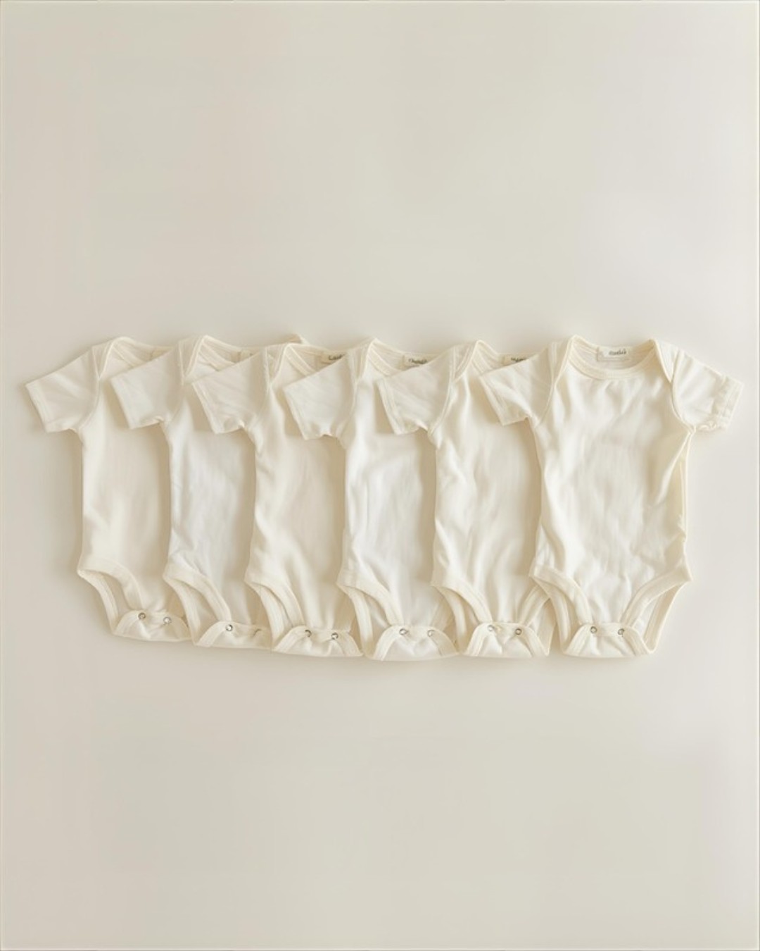 Guía de talles de ropa para bebé — tabla por peso, altura y edad: RN hasta 4kg, 0-3M hasta 6kg, 3-6M hasta 8kg